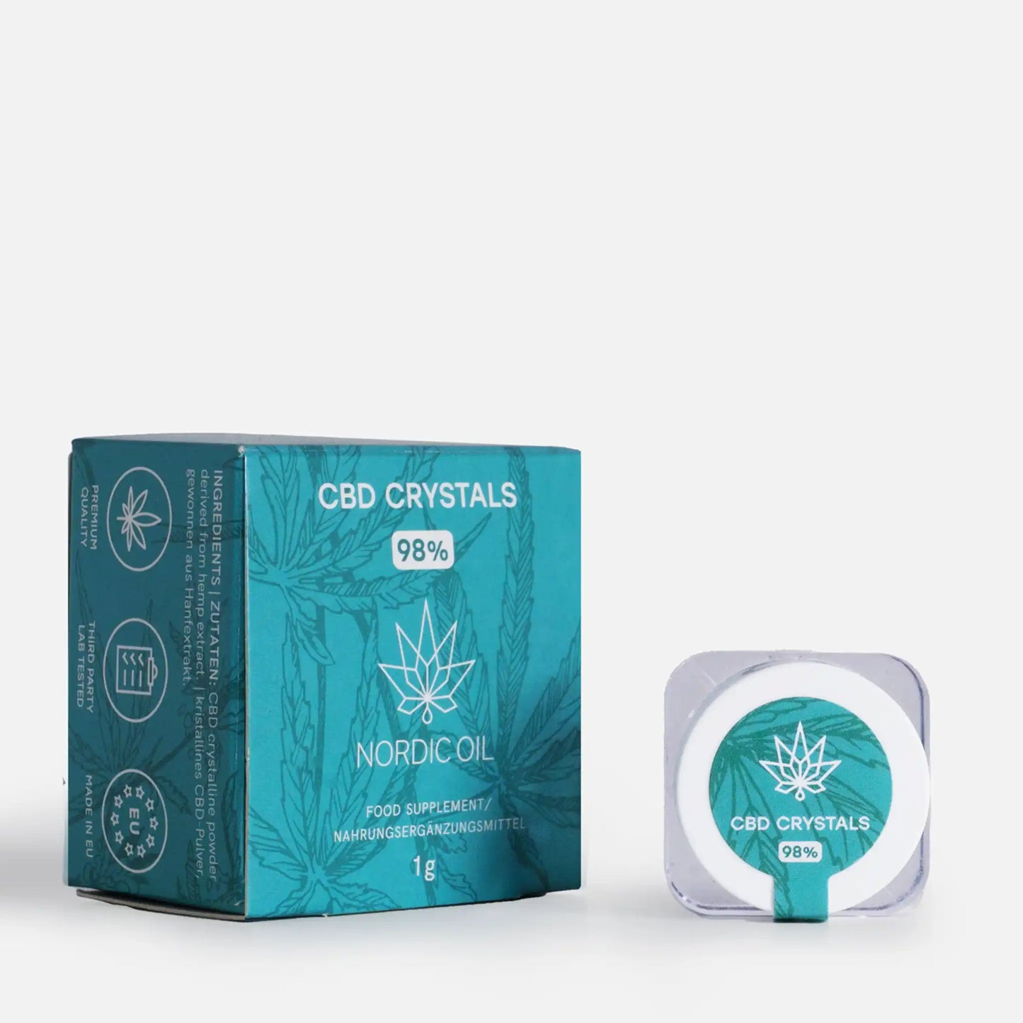 De CBD-kristallen liggen naast de verpakking.